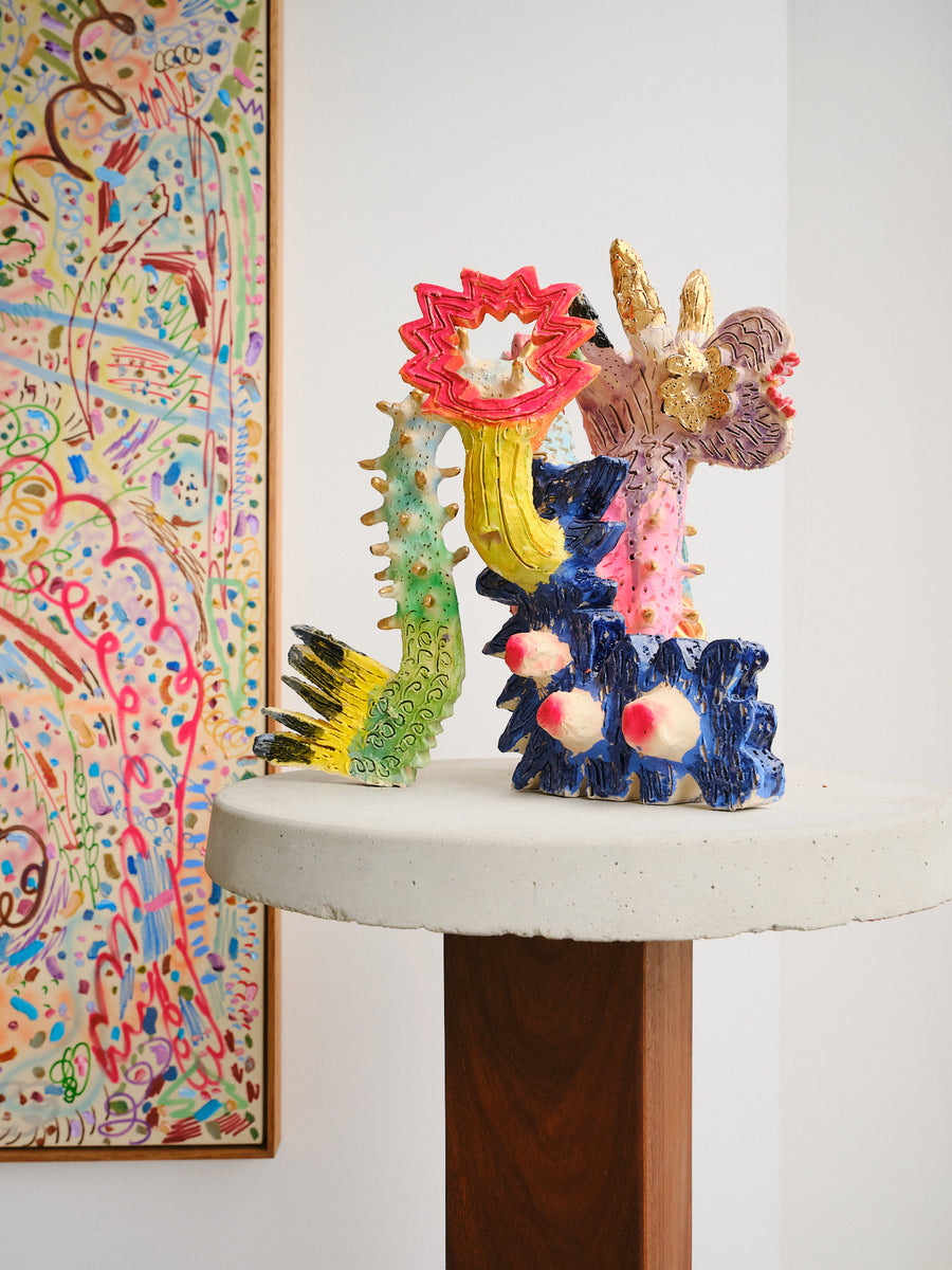 Figure With Eight Horns