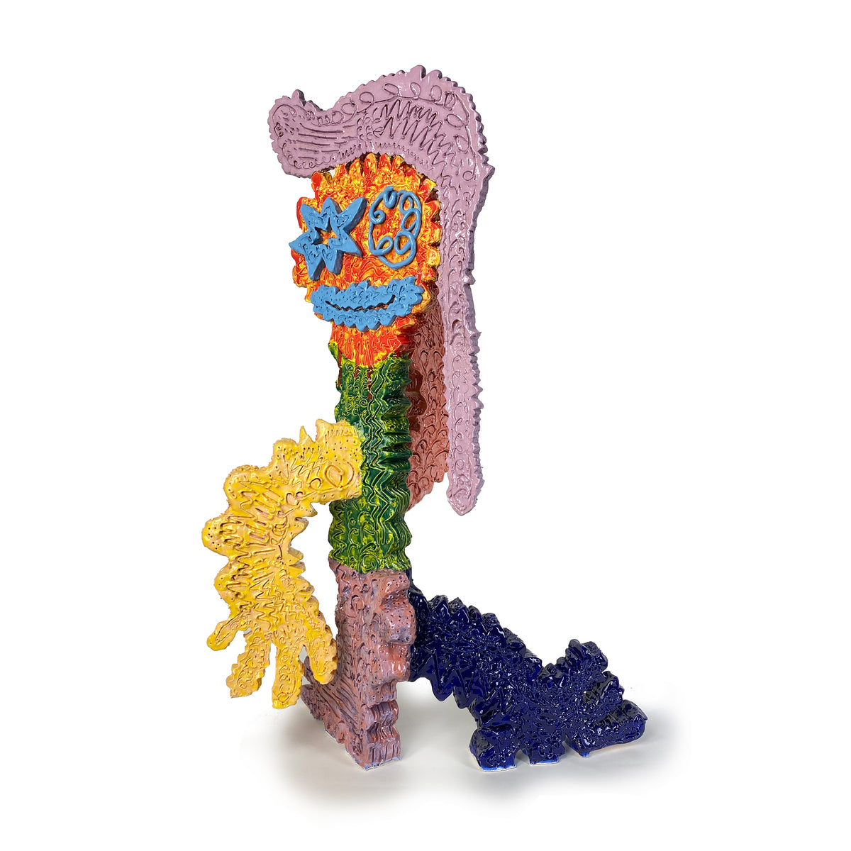 Figure With Turquoise Eyes and Mouth With Red Yellow Face